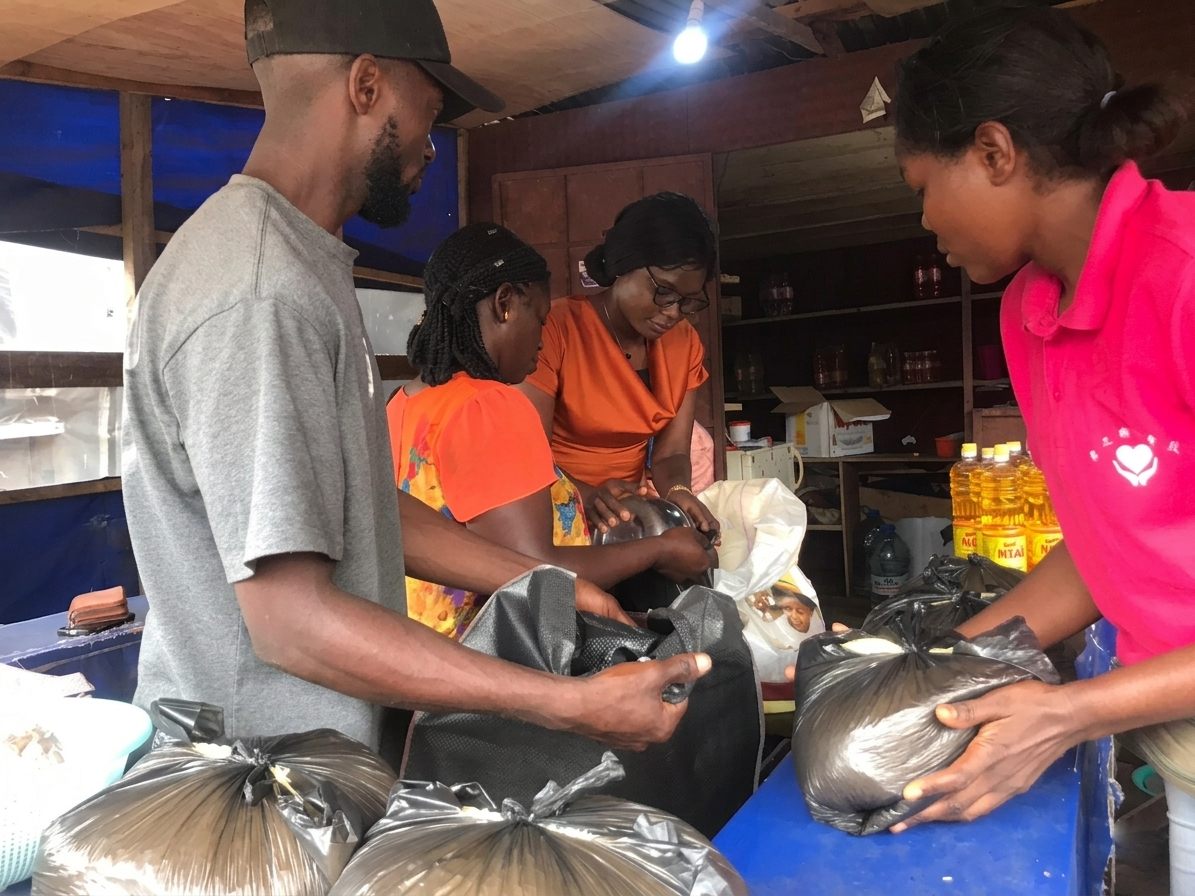 Volunteers preparing humanitarian supplies for distribution